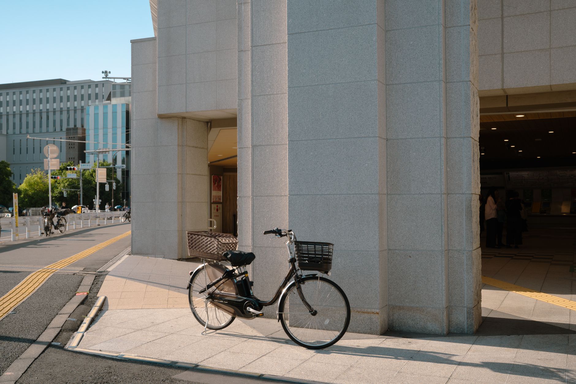 A cyclist riding on a street in Tokyo